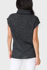 Back of woman modeling Cap Sleeve Funnel Neck Top in Black styled business casual