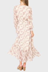 Back of Woman modeling Flowy Wrap Maxi Dress in Dot Fawn chiffon print styled for fall work