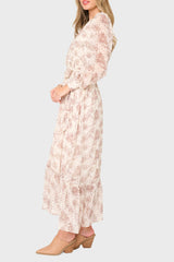 Side of Woman modeling Flowy Wrap Maxi Dress in Dot Fawn chiffon print styled for fall business casual