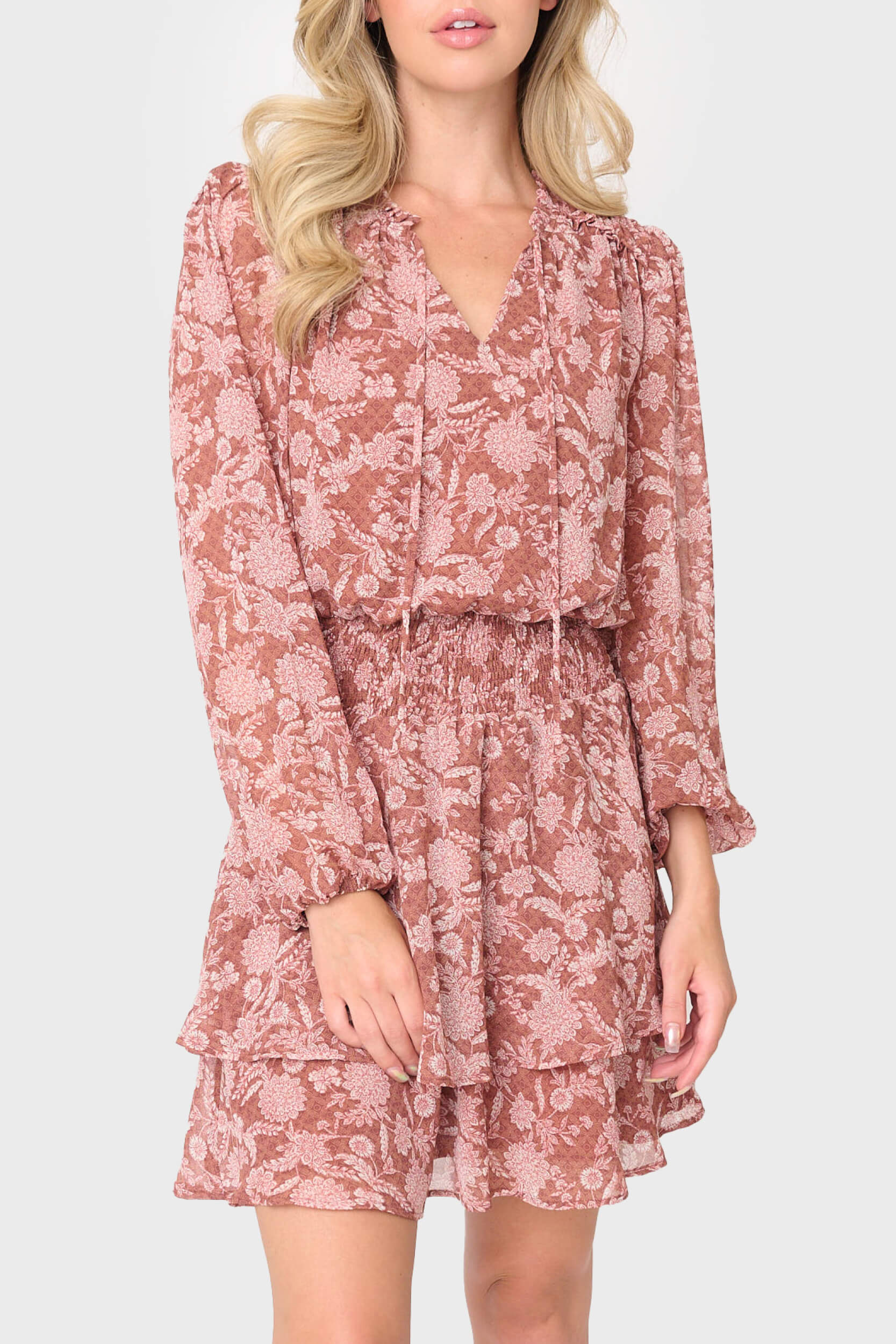 Woman modeling Long Sleeve Smocked Detail Dress in Burgundy Floral Scroll Print styled business casual