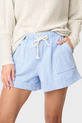 Woman modeling Favorite Summer Short in Chambray Herringbone styled with casual sweater
