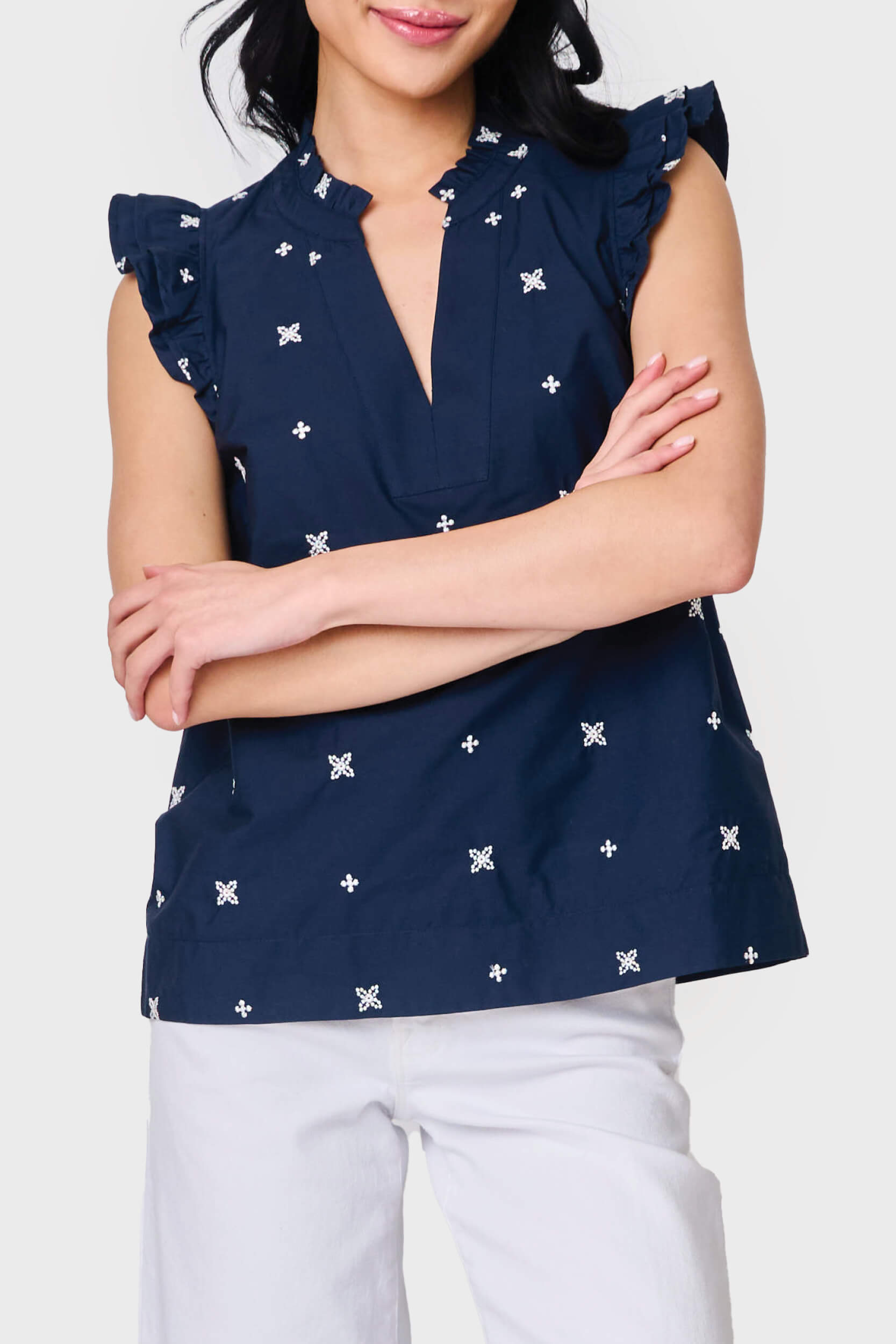 Woman modeling Decked Out Day Top in Navy Embroidered styled with casual pants