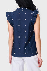 Back view of Woman modeling Decked Out Day Top in Navy Embroidered styled with casual pants