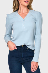 Woman modeling The Amelia Ribbed Henley Top in light Blue Fog, styled everyday casual