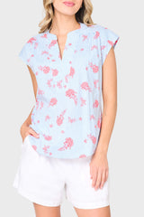 Woman modeling Cap Sleeve Notch Neck Blouse in blue stripe red floral print. Styled for vacation, weekends, and everyday