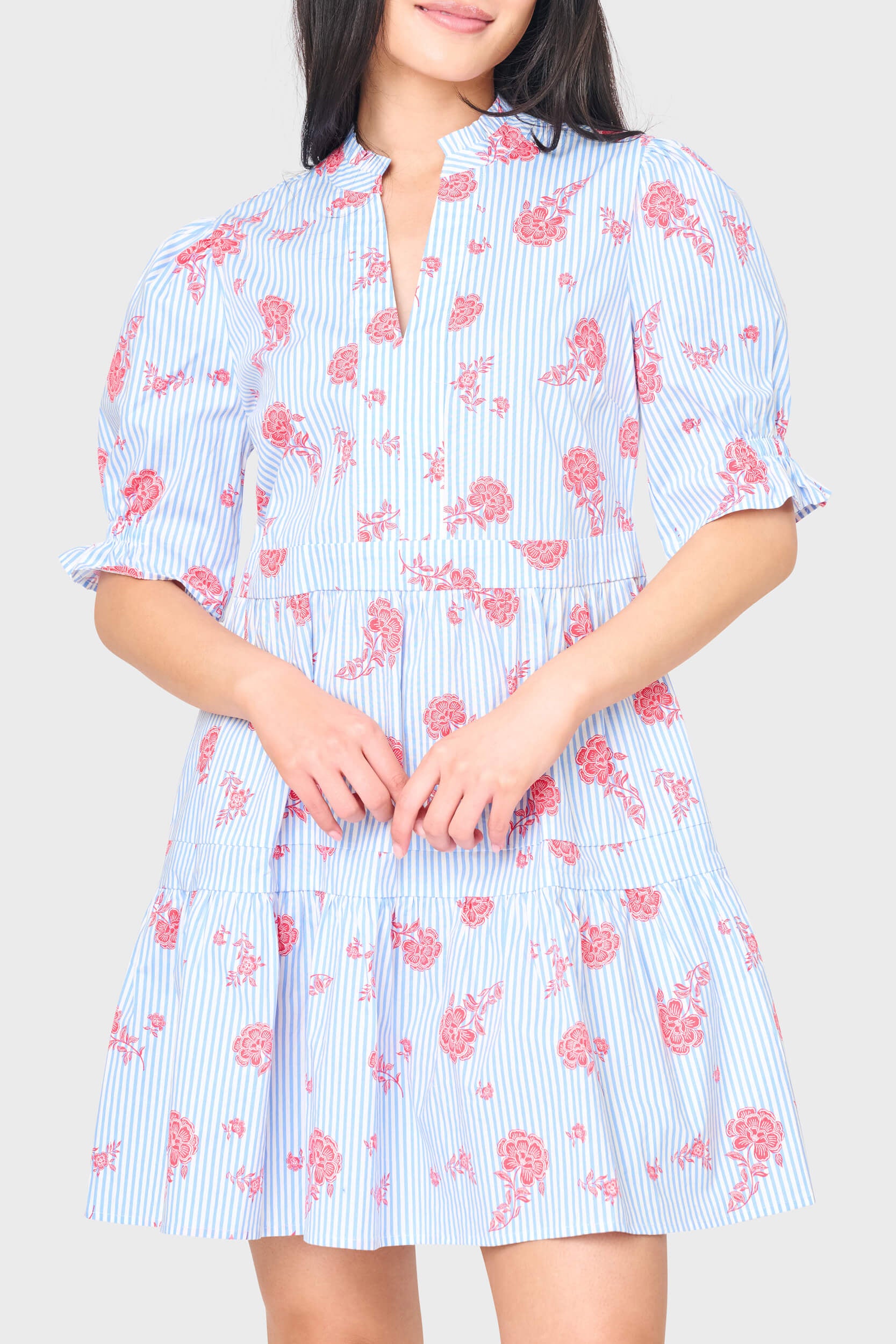 Woman modeling Puff Elbow Sleeve Decked Out Day Dress in Nautical Rose stripe styled for work to weekends