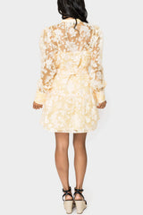 Back of women wearing the En Saison Marais Mini Dress in yellow