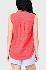 Back view of Woman modeling Cameron Day Top with Crochet Trim in Hibiscus red styled with casual shorts