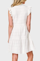 Back view of Woman modeling Flutter Sleeve Decked Out Day Dress in White styled for summer weekend