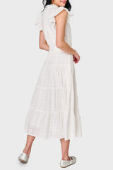 Back view of Woman modeling Dianthus Maxi Dress in White
