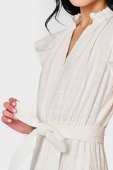 Woman modeling Dianthus Maxi Dress in White tie waist detail