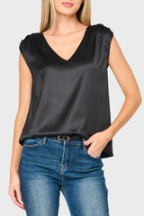 Woman modeling Reverly Cinched Detail Satin Top in Black styled business casual