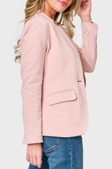 Side view of Woman modeling Notch Collar soft knit Blazer in Pink Smoke styled business casual