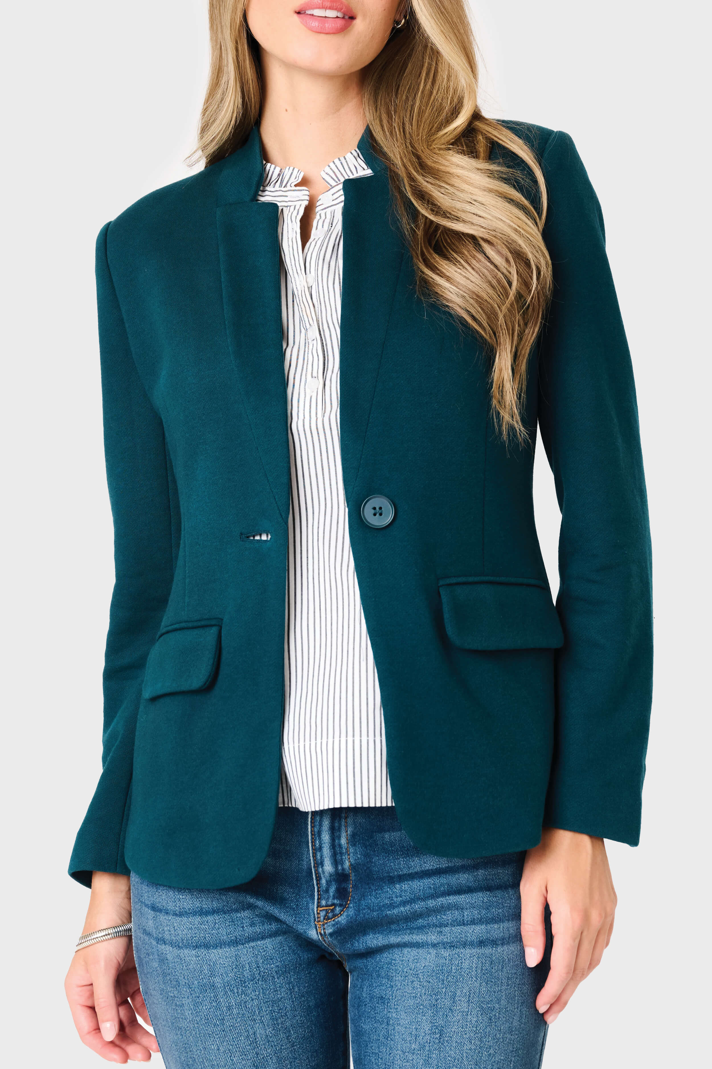 Woman modeling Notch Collar Blazer in Reflecting Pond Teal green, styled business casual