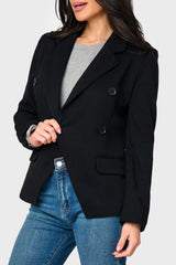 Woman modeling Double Breasted Knit Blazer in Black styled business casual