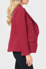 Side of Model wearing Double Breasted Blazer in Cabernet Red styled for the office