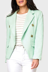 Woman modeling Double Breasted Knit Blazer in Surf Spray mint green styled business casual