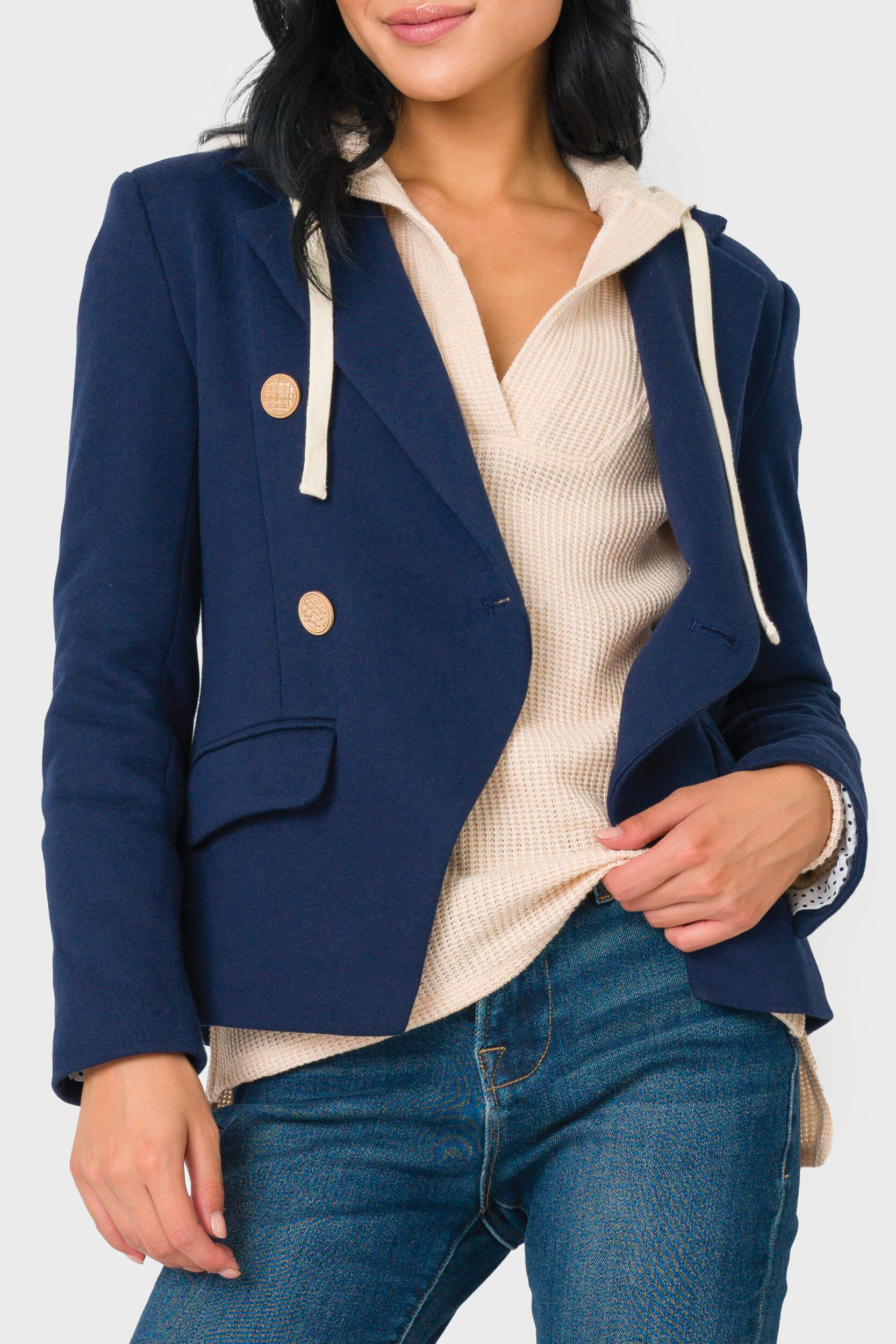 Woman modeling Double Breasted knit Blazer in Navy Blue styled business casual