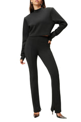 Front of women wearing the Good American Scuba Flare Pants