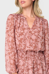 Detail of Woman modeling Long Sleeve Smocked Detail Dress in Burgundy Floral Scroll boho Print
