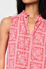 Woman modeling Cameron Day Top with Crochet Trim in Red Scarf Print detail of ruffle trim split neckline