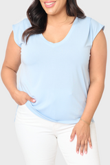 Plus Size Woman modeling The Favorite Luxe Essentials V-Neck Tee in Light Sky Blue styled for summer