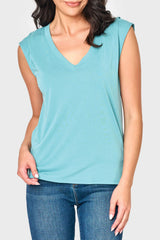 Model wearing The Favorite Luxe Essentials V-Neck Tee in Fern Green styled for everyday comfort