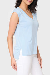Side of Woman modeling The Favorite Luxe Essentials V-Neck Tee in Light Sky Blue styled casual