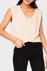 Woman modeling The Favorite Luxe Essentials V-Neck Tee in beige tan styled for everyday comfort