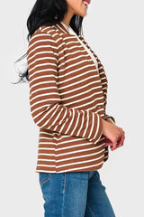 Side view of Woman modeling Notch Collar Blazer in soft knit Saddle Ivory Stripe styled business casual