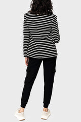 Back view of Woman modeling a Striped Notch Collar Blazer in black white stripe sweatshirt knit styled business casual