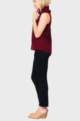 Side of Woman modeling Turtleneck Cable Stitch Sweater Vest in Burgundy red styled for work and everyday