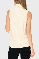Back of woman modeling Turtleneck Cable Stitch Sweater Vest in cream styled business casual for work