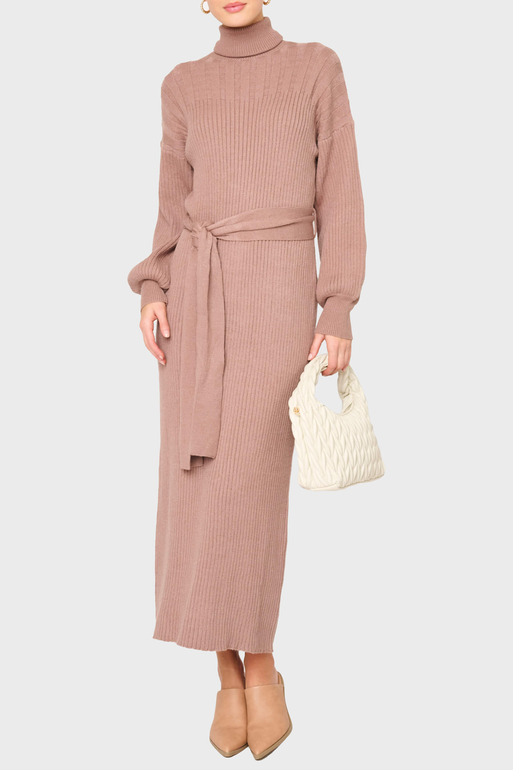 Woman modeling Turtleneck Maxi Sweater Dress in taupe brown styled business casual for work