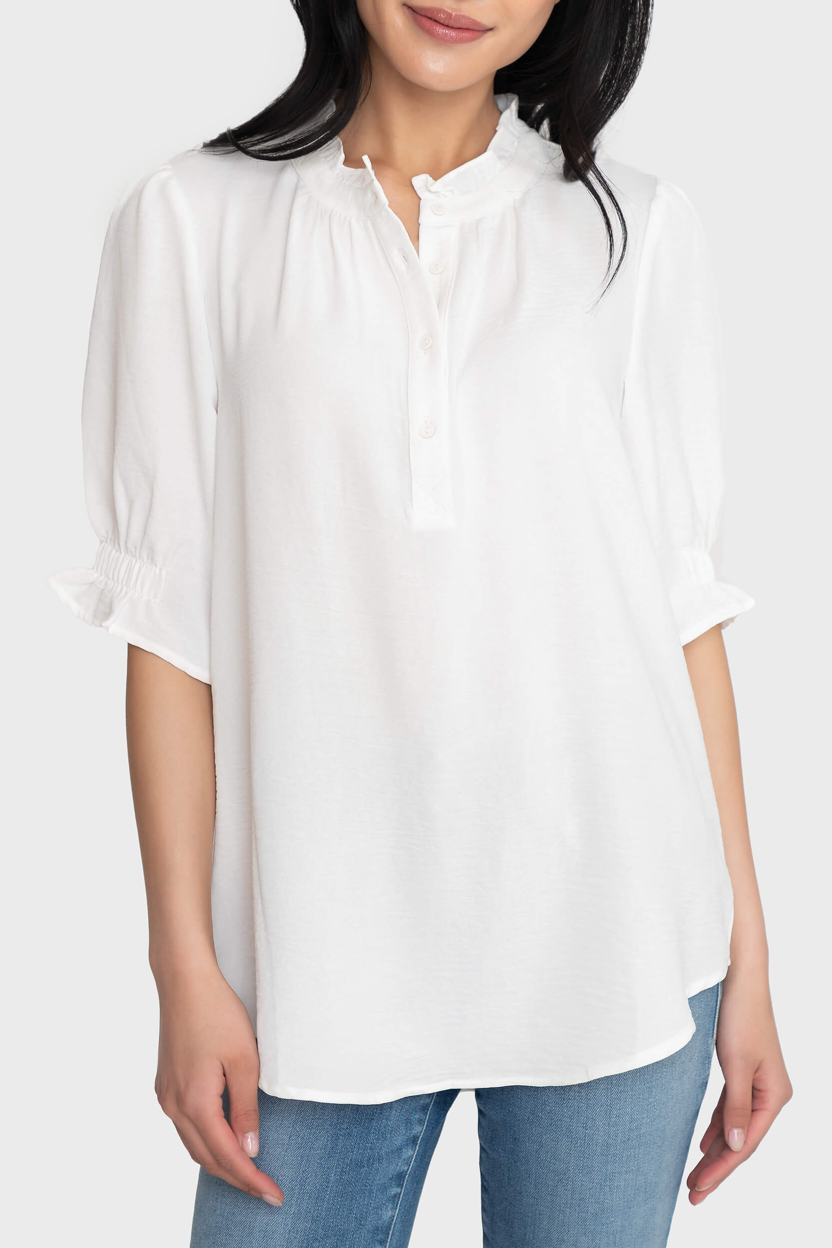Model wearing Dianthus Henley Puff Sleeve Blouse in White styled business casual for work