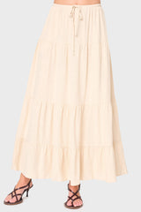 Model wearing Tiered Ultra Maxi Skirt in Natural styled for vacations and everyday