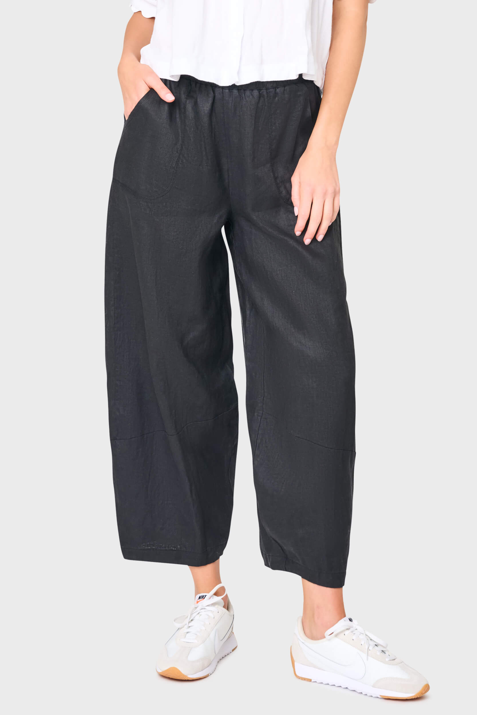 Woman modeling Linen Barrel Cropped Pant in Black styled for everyday wear