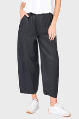 Woman modeling Linen Barrel Cropped Pant in Black styled for everyday wear
