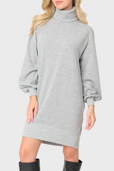 Woman modeling Blouson Sleeve Turtleneck Sweater Dress in heather grey styled casual