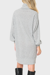 Back of Woman modeling Blouson Sleeve Turtleneck Sweater Dress in heather grey styled casual