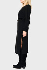 Side of Woman modeling Long Sleeve V-Neck Midi Sweater Dress in Black styled business casual for work