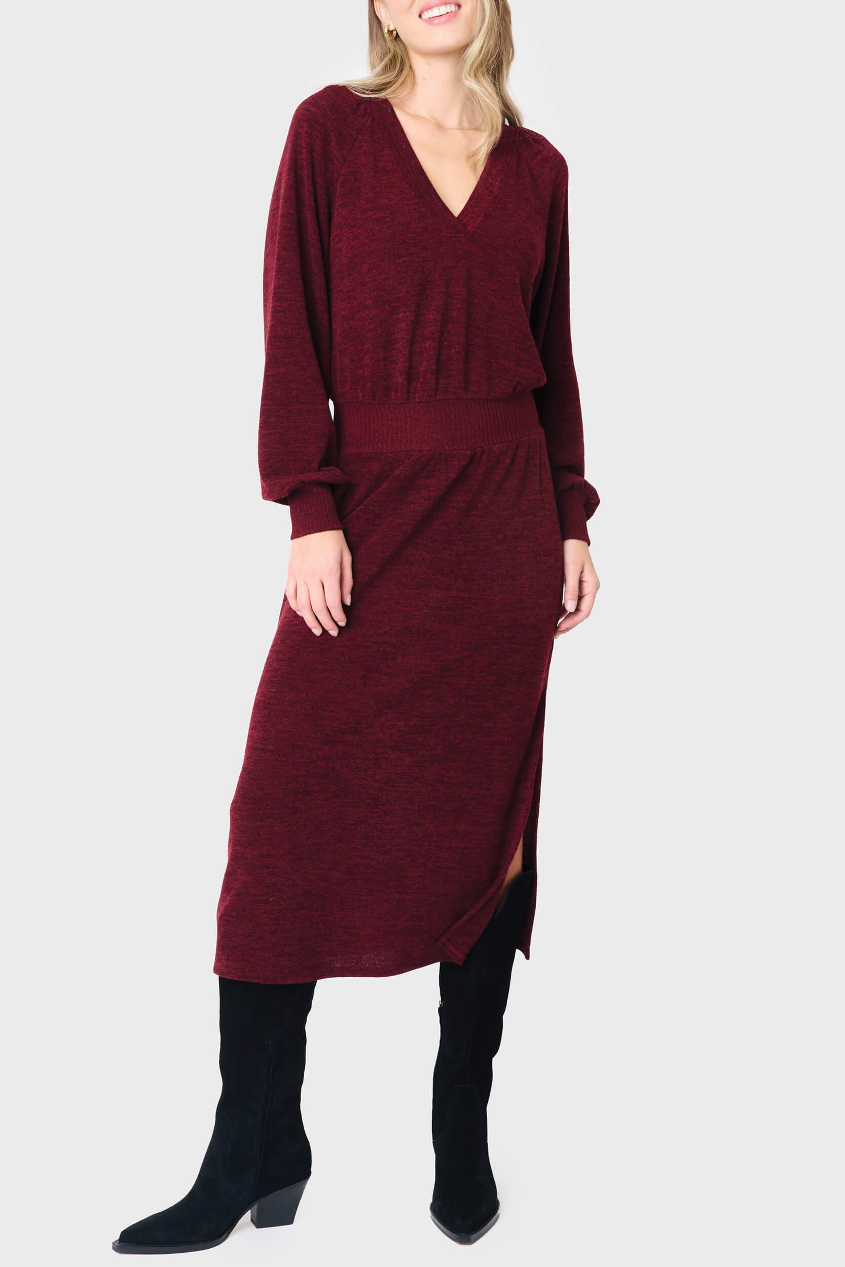 Woman modeling Long Sleeve V-Neck Midi Sweater Dress in Red Wine Bugundy styled for work and weekends