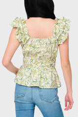 Back view of Woman modeling Elle Boho Flutter Sleeve Top in Secret Garden Print print styled with denim