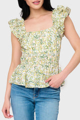 Woman modeling Elle Boho Flutter Sleeve Top in Secret Garden Print print styled with denim