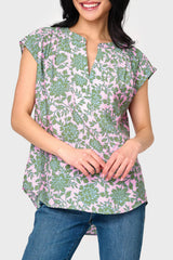 Woman modeling Cap Sleeve Notch Neck Blouse in Rose Garden print styled business casual