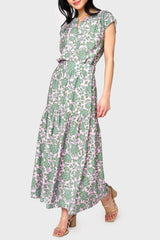 Full body view of woman modeling Cap Sleeve Notch Neck Blouse in Rose Garden print styled with matching skirt for work