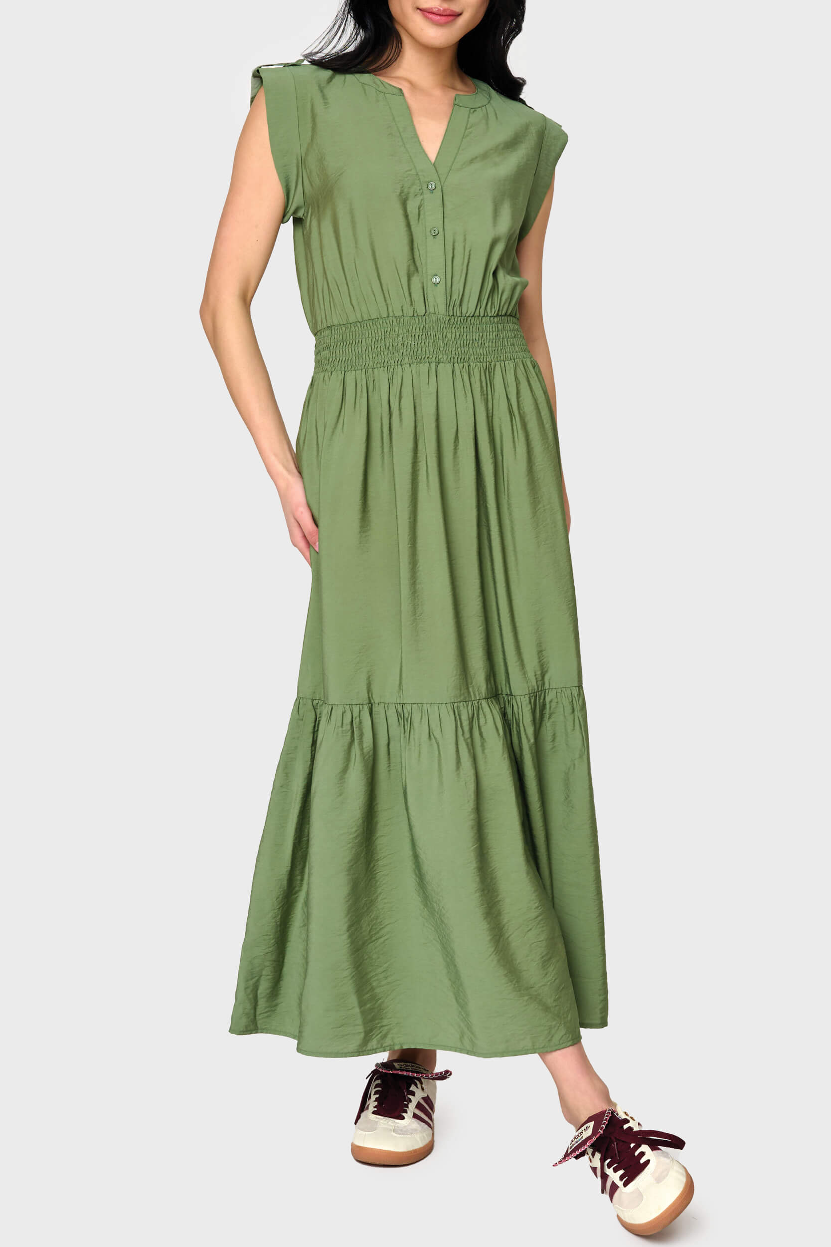 Woman modeling Lindsey Utility Maxi Dress in Vineyard Green styled everyday casual with sneakers