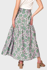 Back view Woman modeling Playa Tiered Maxi Skirt in Rose Garden Floral styled with sandals