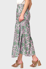 Side view of Woman modeling Playa Tiered Maxi Skirt in Rose Garden Floral styled with sandals