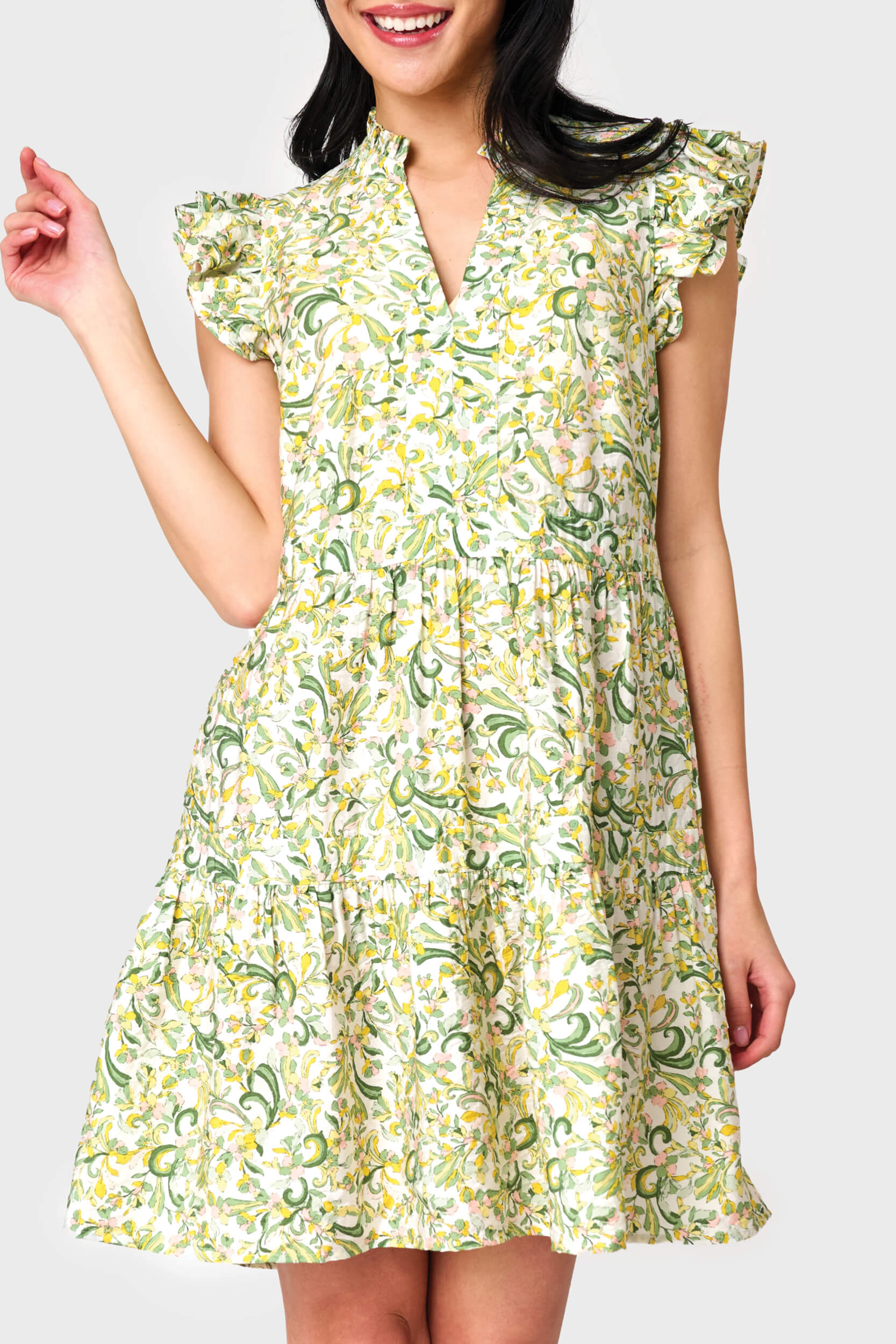 Woman modeling Flutter Sleeve Decked Out Day Dress in Secret Garden print styled comfortable yet dressy
